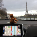 Flint driving near Eiffel Tower